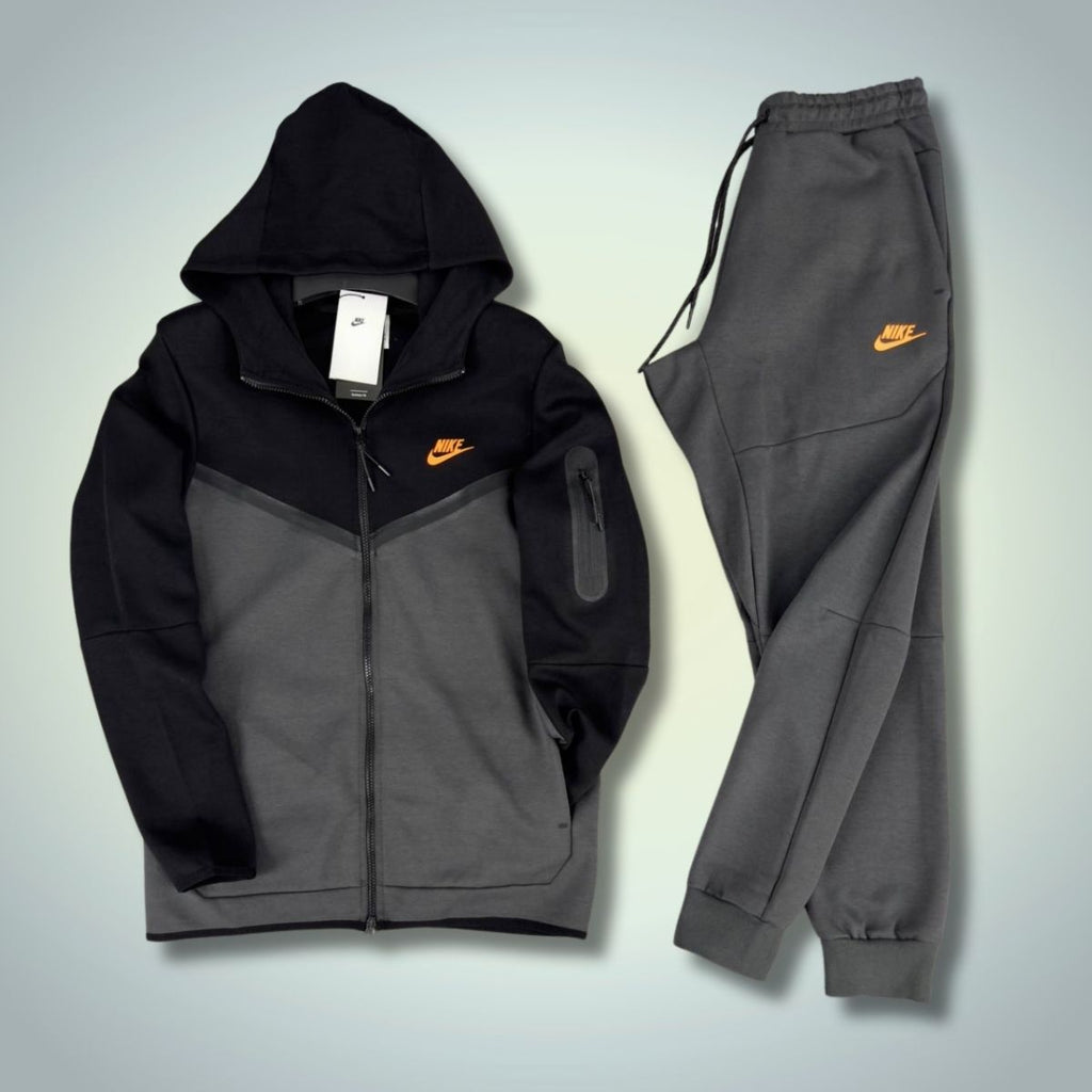 Nike Tech Fleece moška trenirka, črna - grafitna, z oranžnim logotipom. vrhunska kakovost