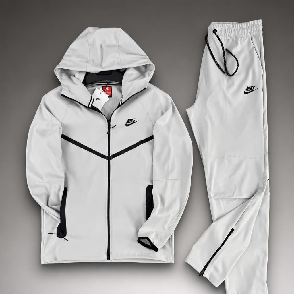 Nike Wooven Tech Fleece siva moška trenirka. Vrhunska kakovost