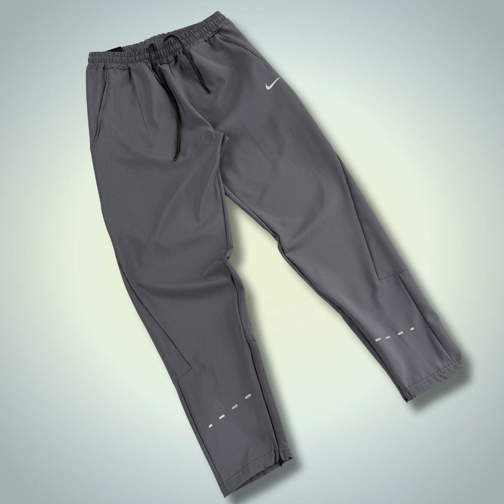 Nike moške nepremočljive športne hlače, grafitne. Premium kakovost